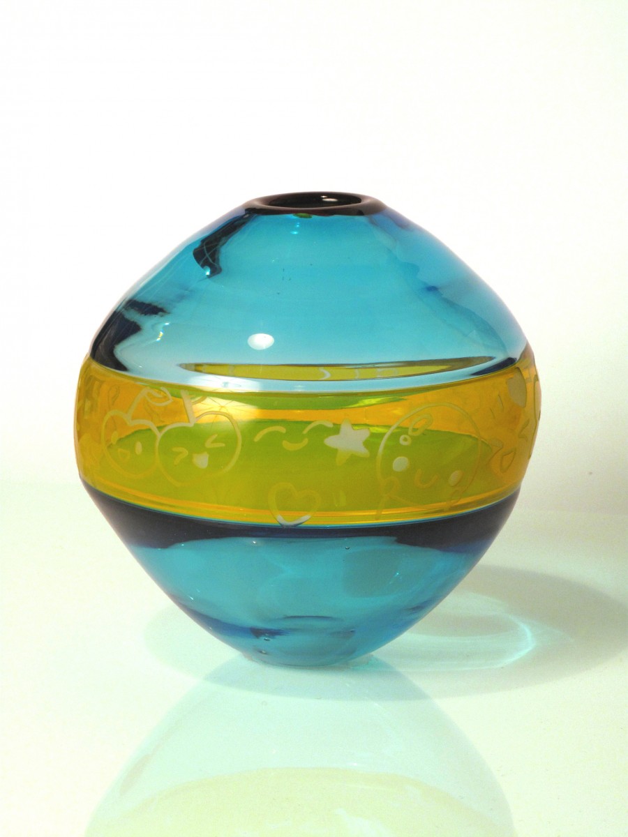 Blue and yellow blown glass vessel with Japanese style graphics