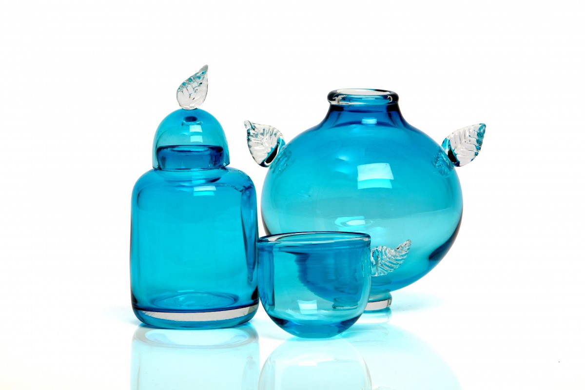 Light blue blown glass vessels with leaf details